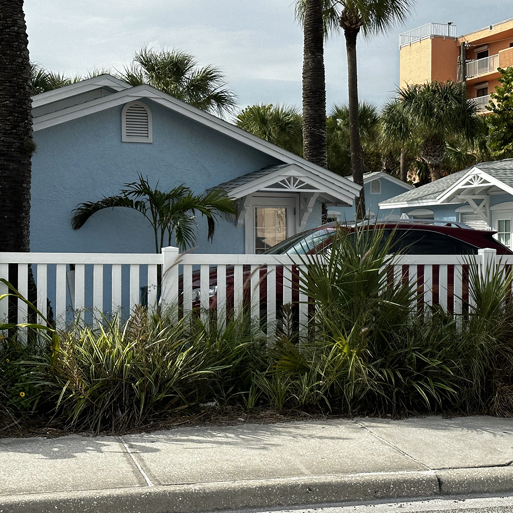 Vinyl Fence In Residential Tropical Area