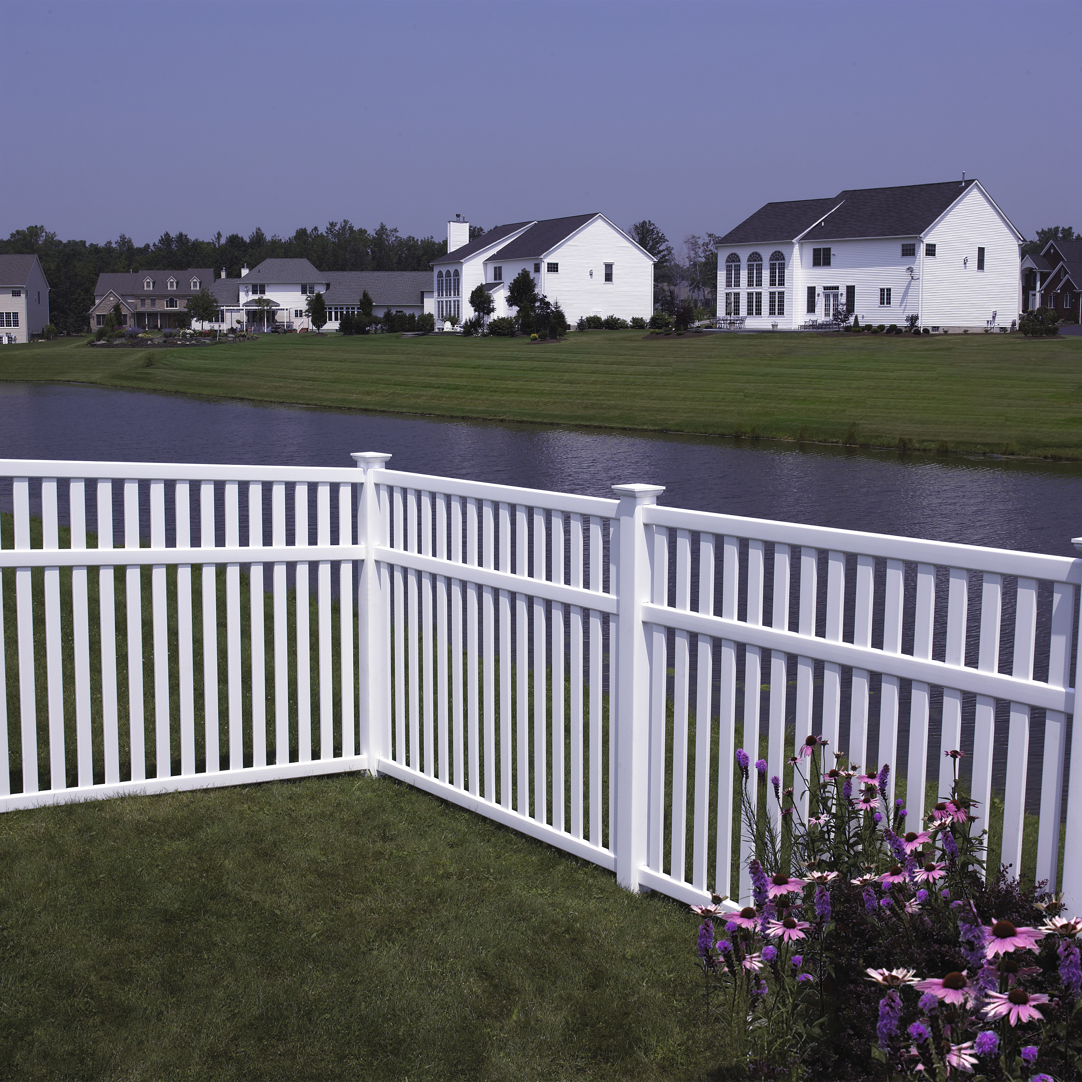 vinyl fence installation image by water